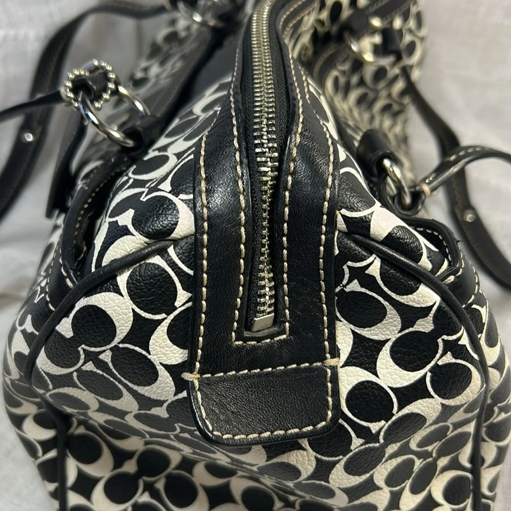Coach boston leather travel bag with a tag